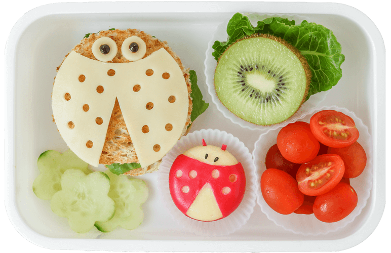 Food tray with a sandwich and assorted fruits, vegetables and cheese